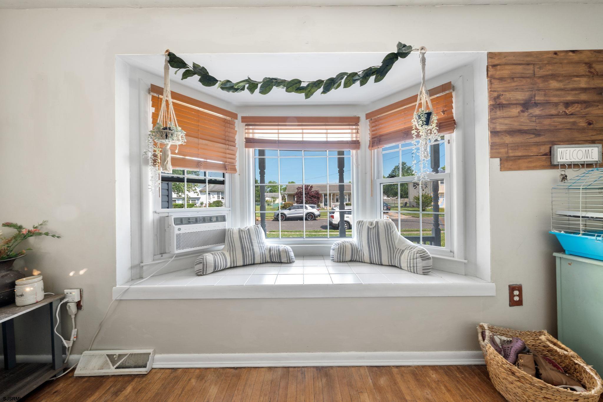 40 Gulph Mill Road Somers Point, NJ 08244 - Photo 6 of 21 a living room with furniture and a large window