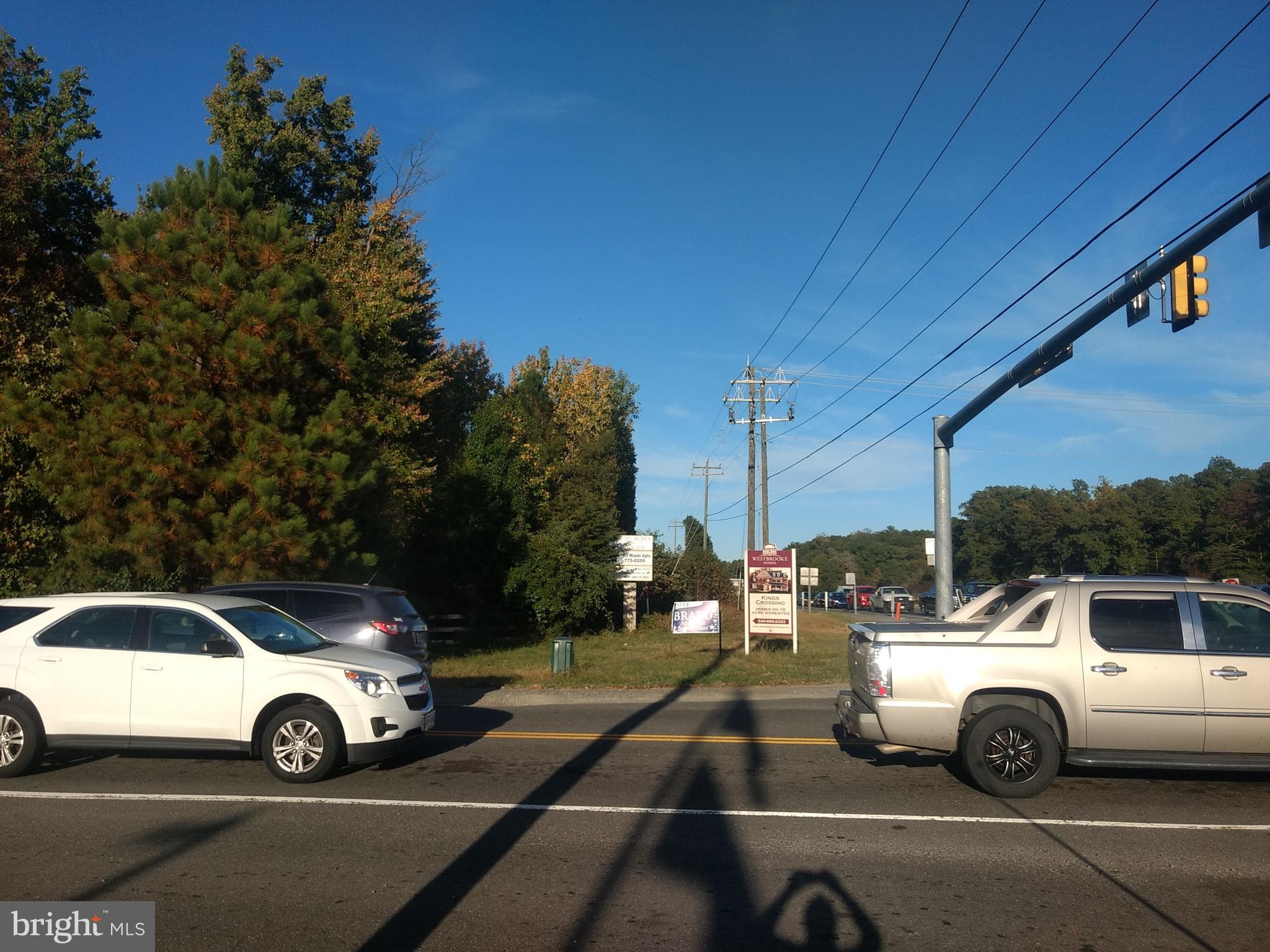 a view of parking with car parked