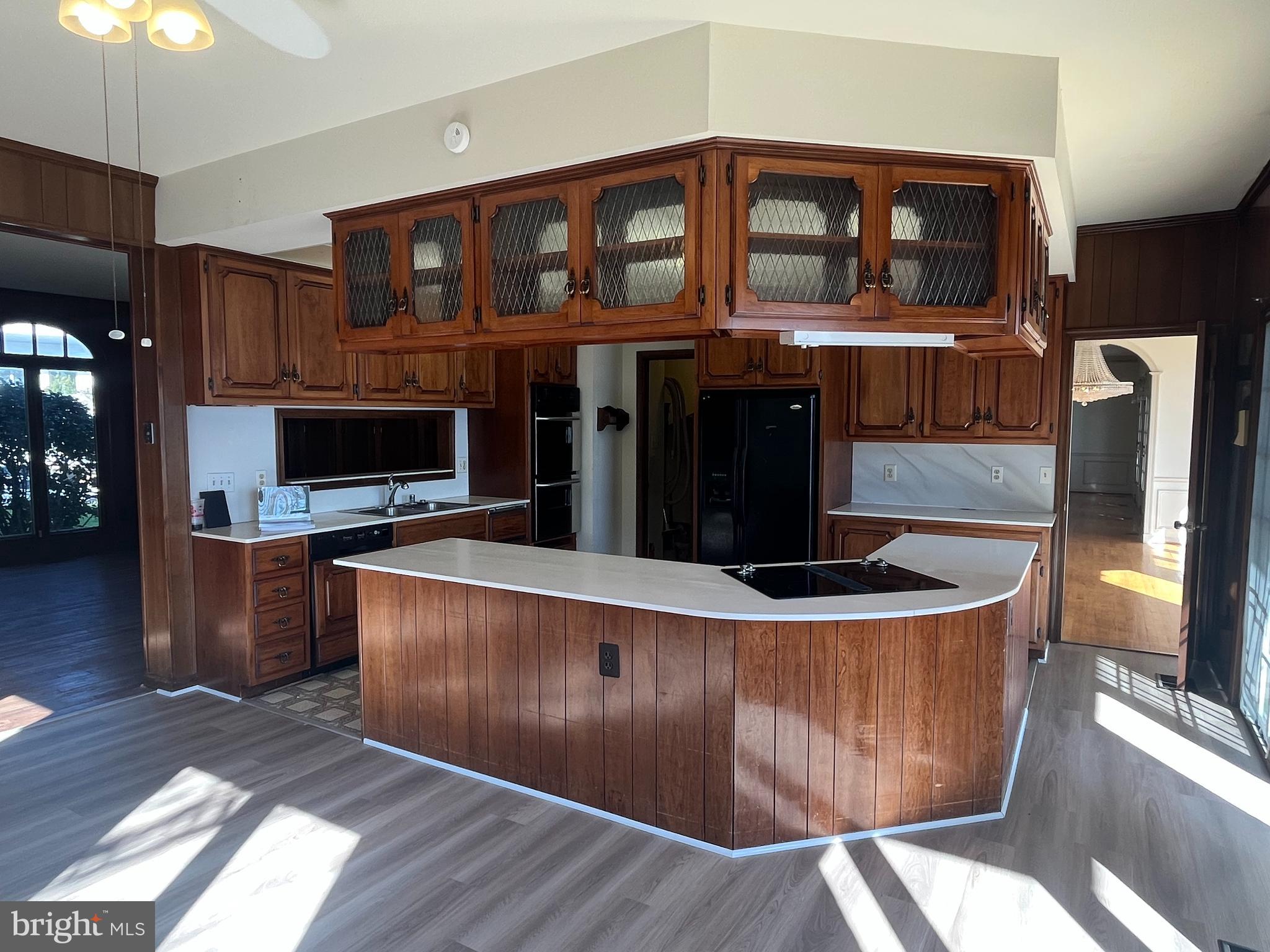 3901 Belle Rive Terrace Alexandria, VA 22309 - Photo 14 of 31 a kitchen with stainless steel appliances granite countertop a stove and a refrigerator