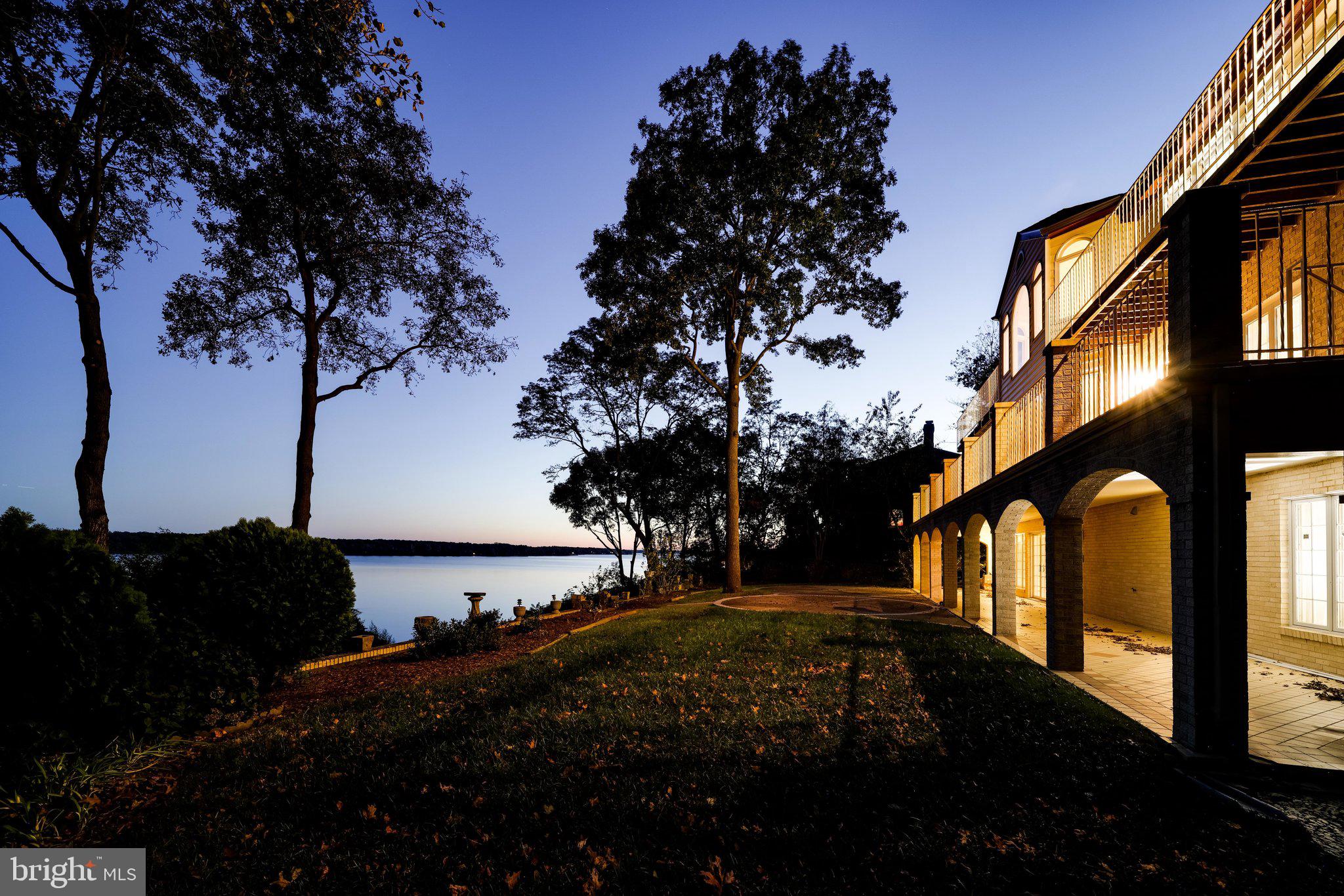 3901 Belle Rive Terrace Alexandria, VA 22309 - Photo 2 of 31 a view of a street with a tree