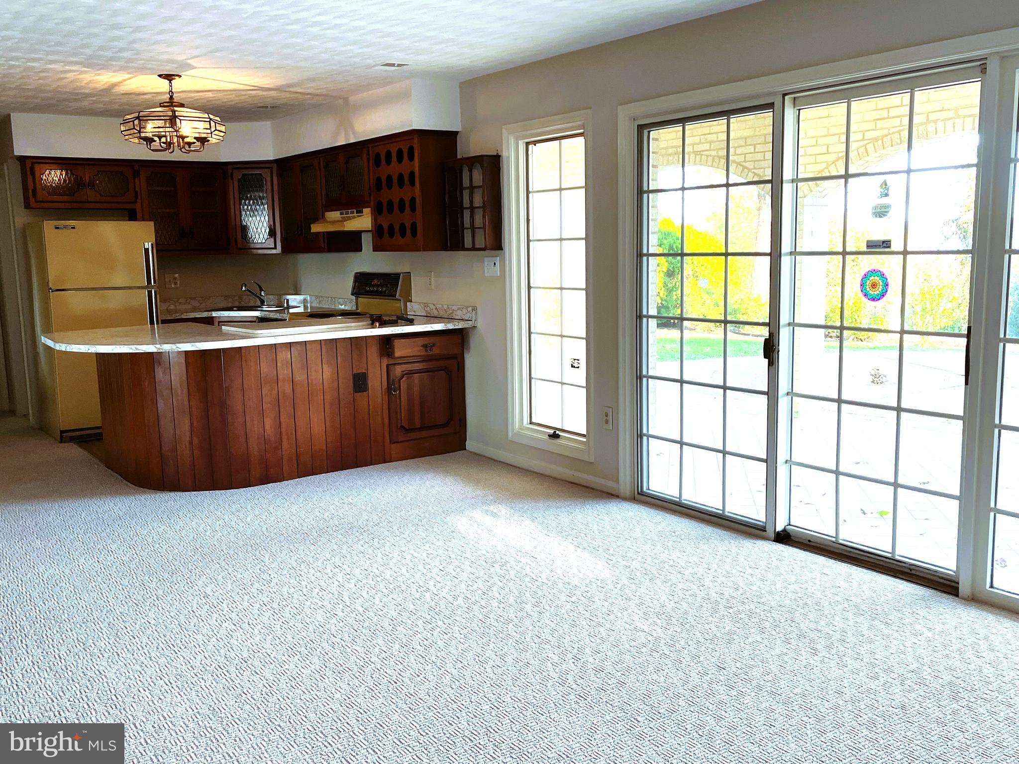 3901 Belle Rive Terrace Alexandria, VA 22309 - Photo 20 of 31 a kitchen with stainless steel appliances granite countertop a stove a sink and a refrigerator