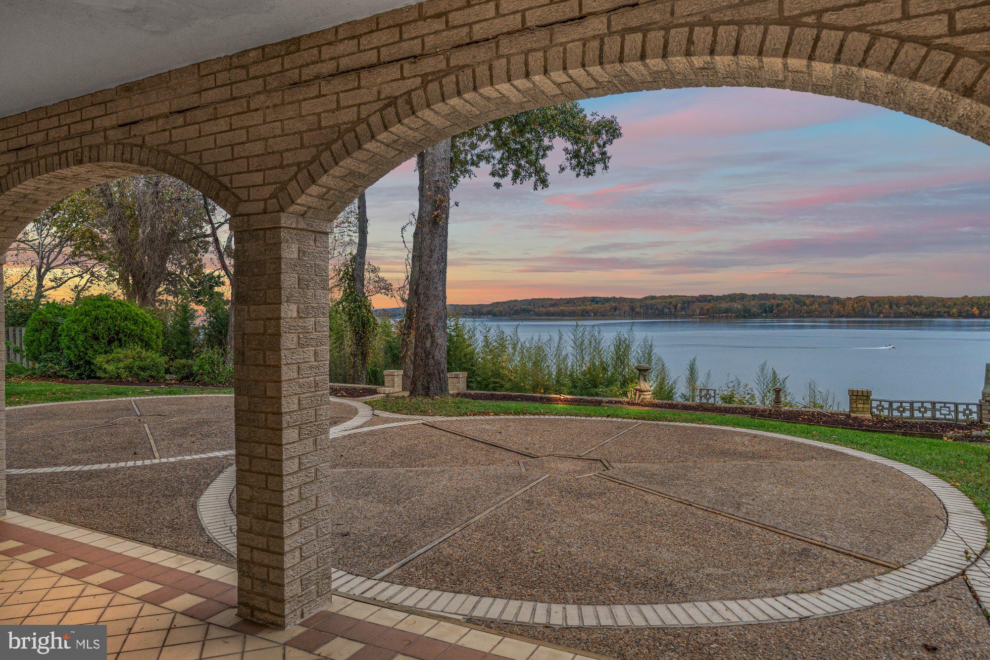 3901 Belle Rive Terrace Alexandria, VA 22309 - Photo 21 of 31 a view of a swimming pool with an outdoor seating and a yard