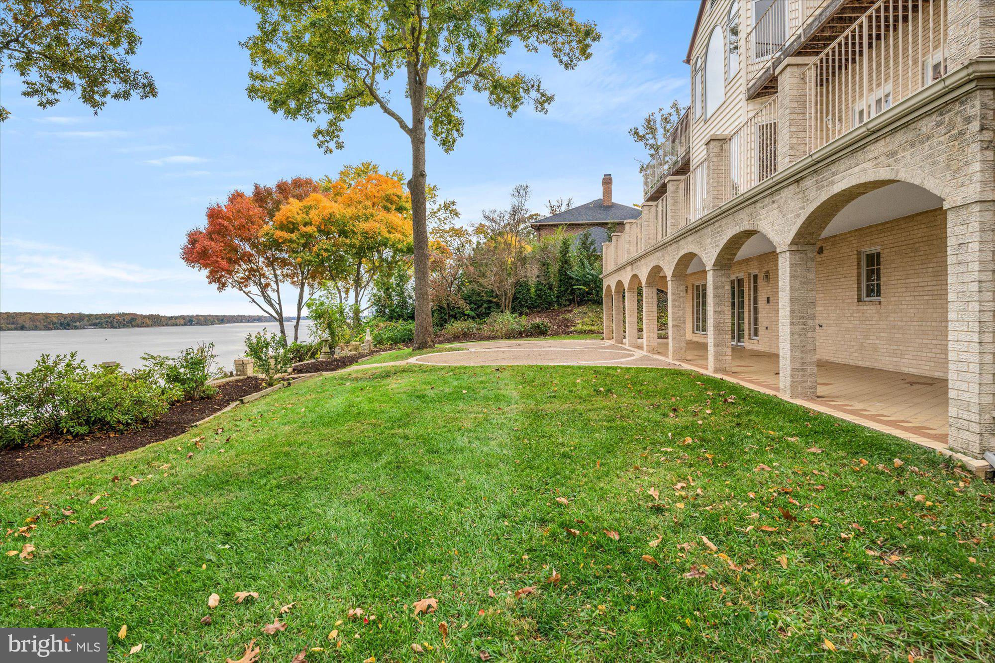3901 Belle Rive Terrace Alexandria, VA 22309 - Photo 4 of 31 a front view of a house with garden