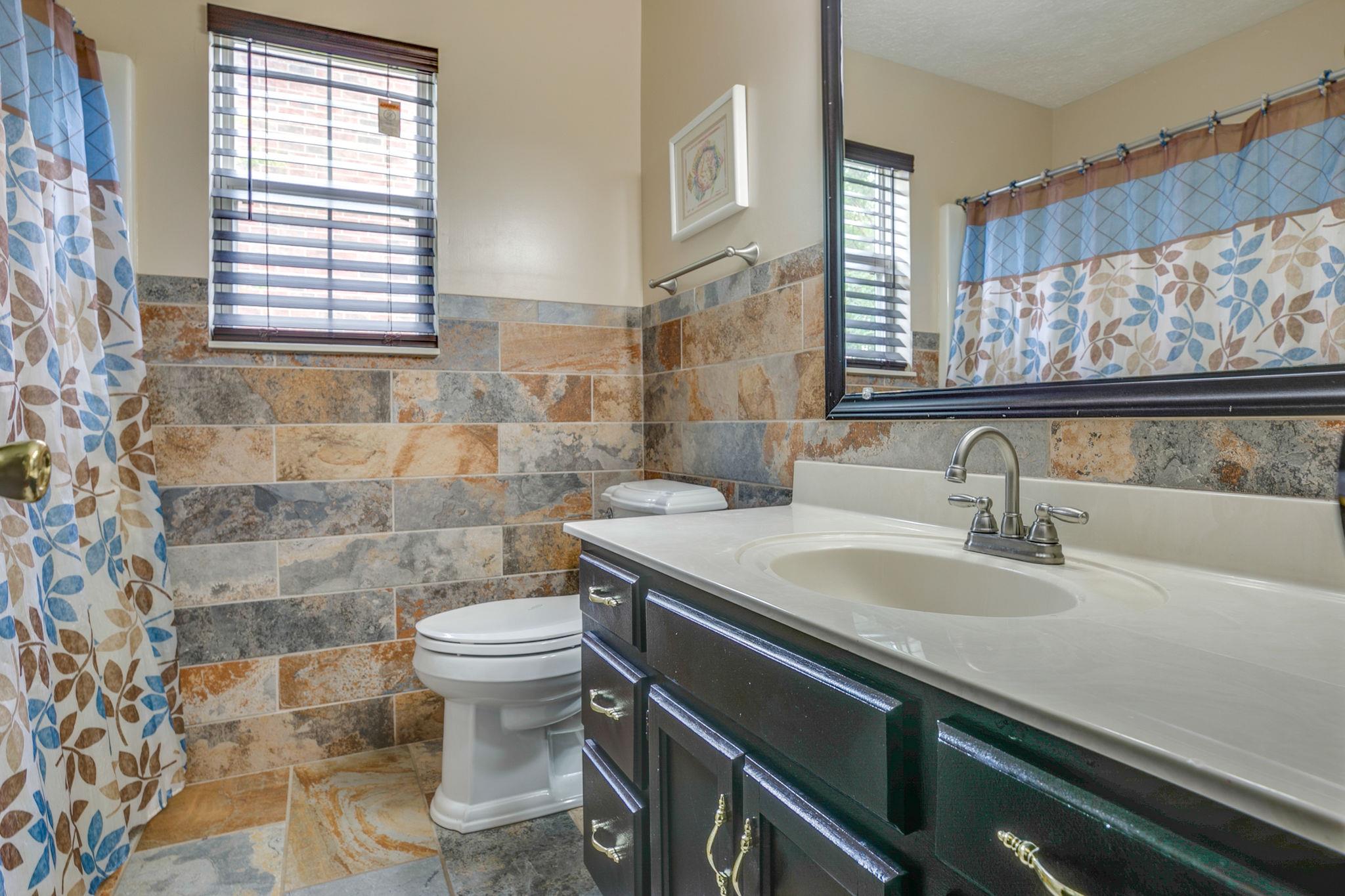 3429 Shakertown Road Antioch, TN 37013 - Photo 18 of 27 Hall Bath with Plenty of County Space and Custom Tile Surround