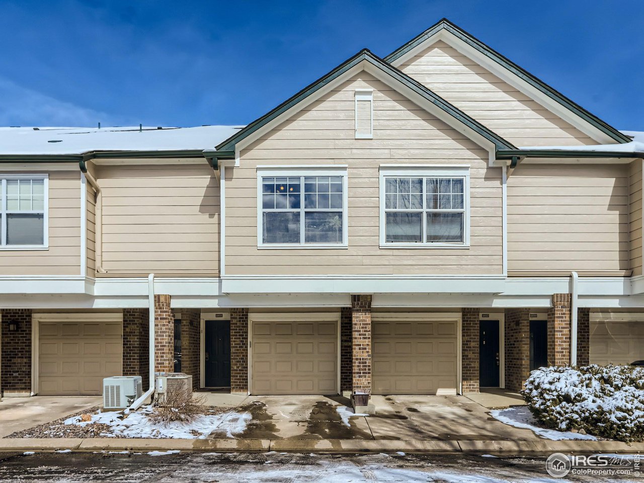 1855 Spaulding Circle Superior, CO 80027 - Photo 15 of 17 a view of the house with two windows and yard