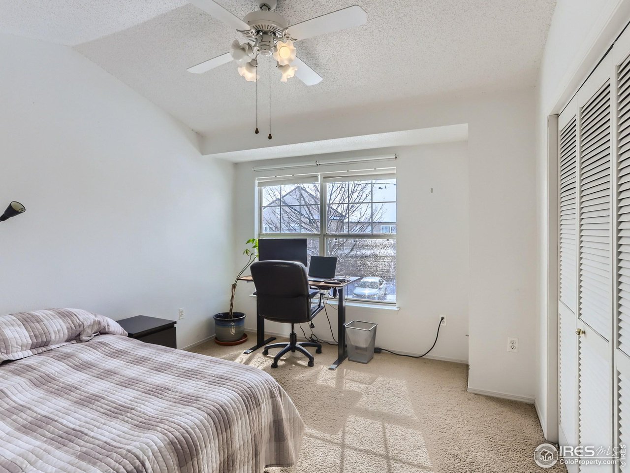 1855 Spaulding Circle Superior, CO 80027 - Photo 8 of 17 a view of a workspace with furniture and a window