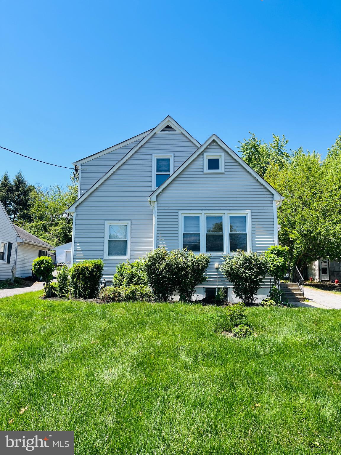 114 South Bishop Avenue Springfield, PA 19064 - Photo 20 of 20 a front view of a house with a yard and garage