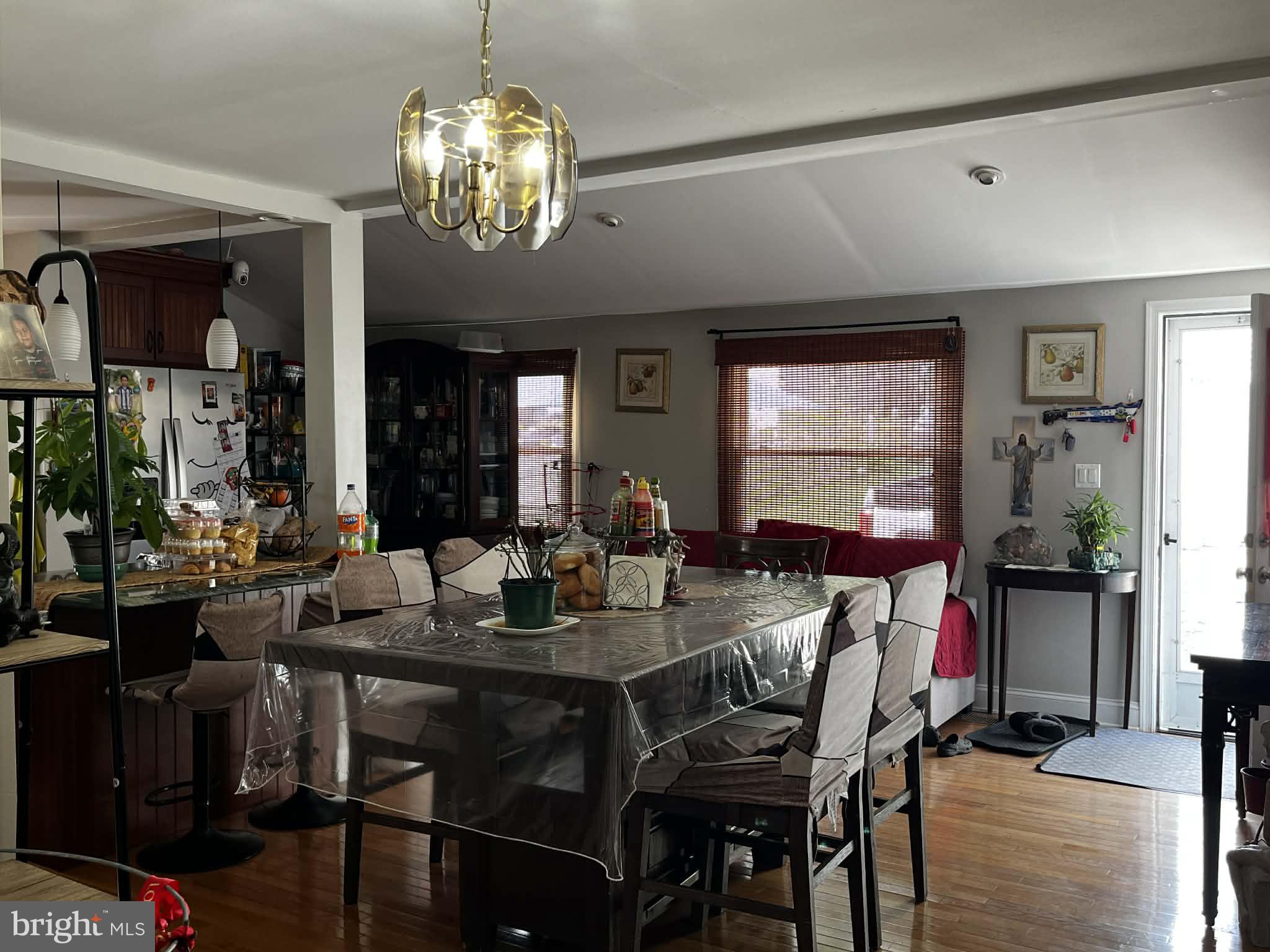 114 South Bishop Avenue Springfield, PA 19064 - Photo 6 of 9 a view of a dining room with furniture wooden floor and chandelier