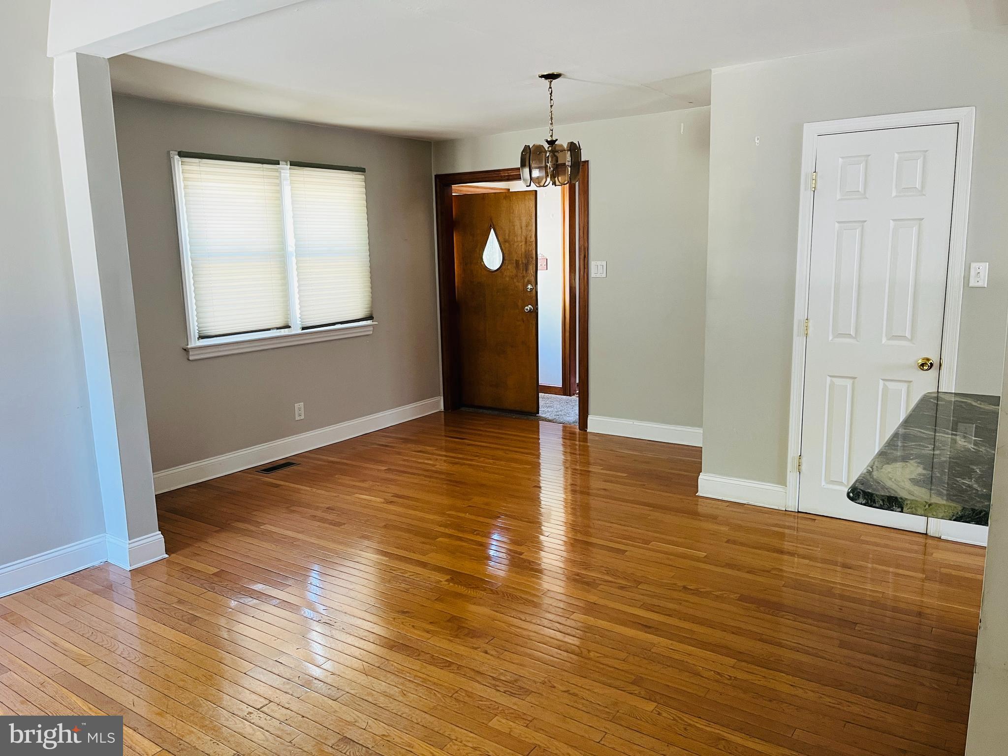 114 South Bishop Avenue Springfield, PA 19064 - Photo 8 of 20 an empty room with wooden floor and windows