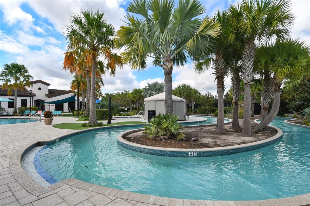 8869 Rhodes Street Kissimmee, FL 34747 - Photo 49 of 66 a swimming pool with outdoor seating yard and barbeque oven
