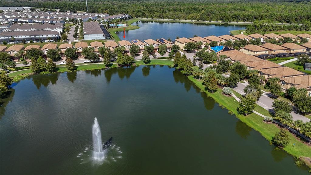 8869 Rhodes Street Kissimmee, FL 34747 - Photo 62 of 66 a view of a lake with houses