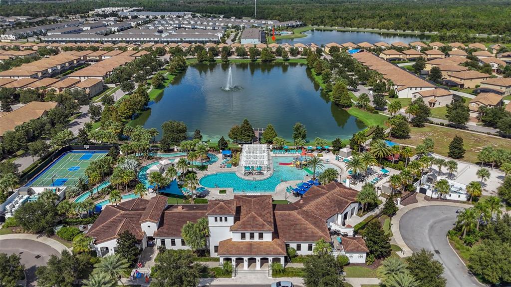 8869 Rhodes Street Kissimmee, FL 34747 - Photo 63 of 66 an aerial view of residential houses with outdoor space and lake view
