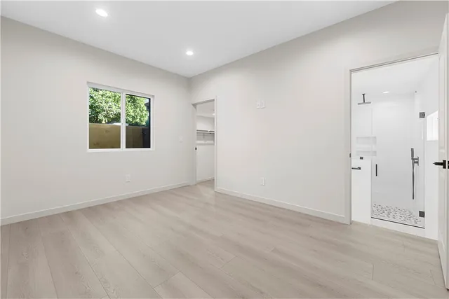 a view of an empty walk in closet