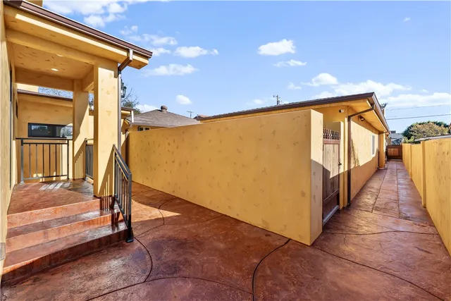 a view of balcony with wooden floor