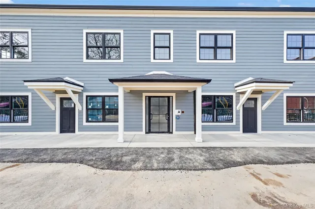 a front view of a house with a porch