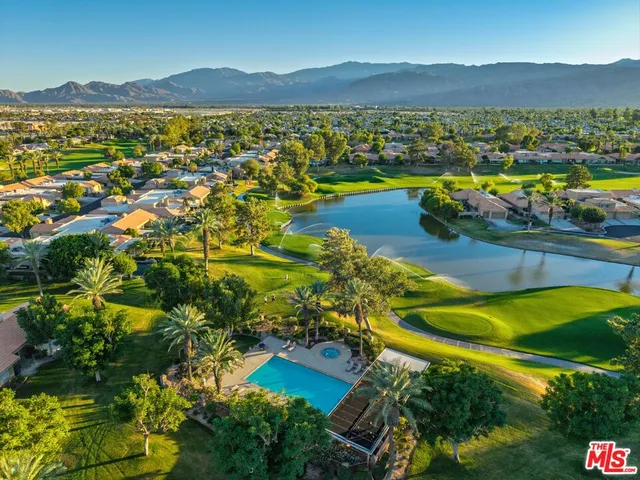 a view of an ocean and a mountain