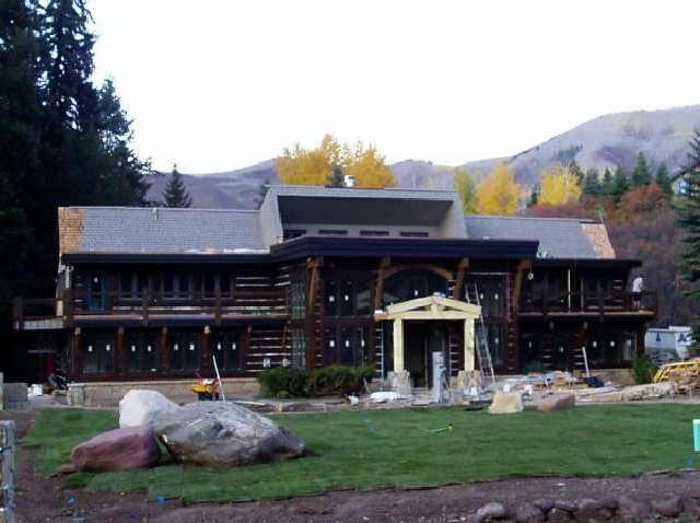 285 Pyramid Road Aspen, CO 81611 - Photo 1 of 2 a front view of a house with garden