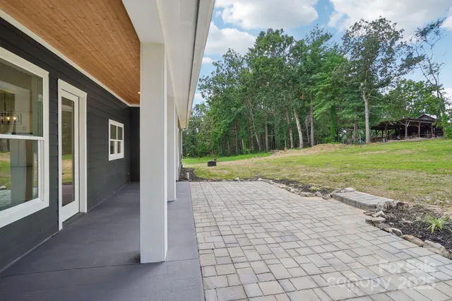 a view of a back yard from a house