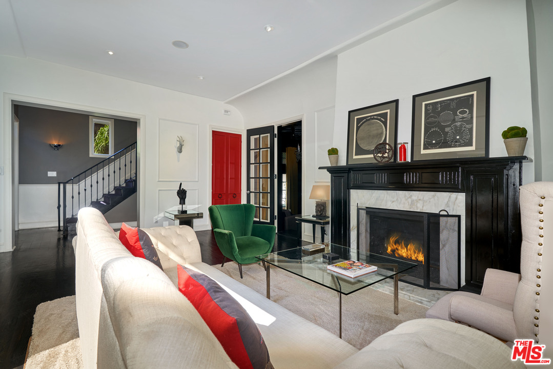 1488 North Kings Road Los Angeles, CA 90069 - Photo 11 of 53 a living room with furniture and a fireplace