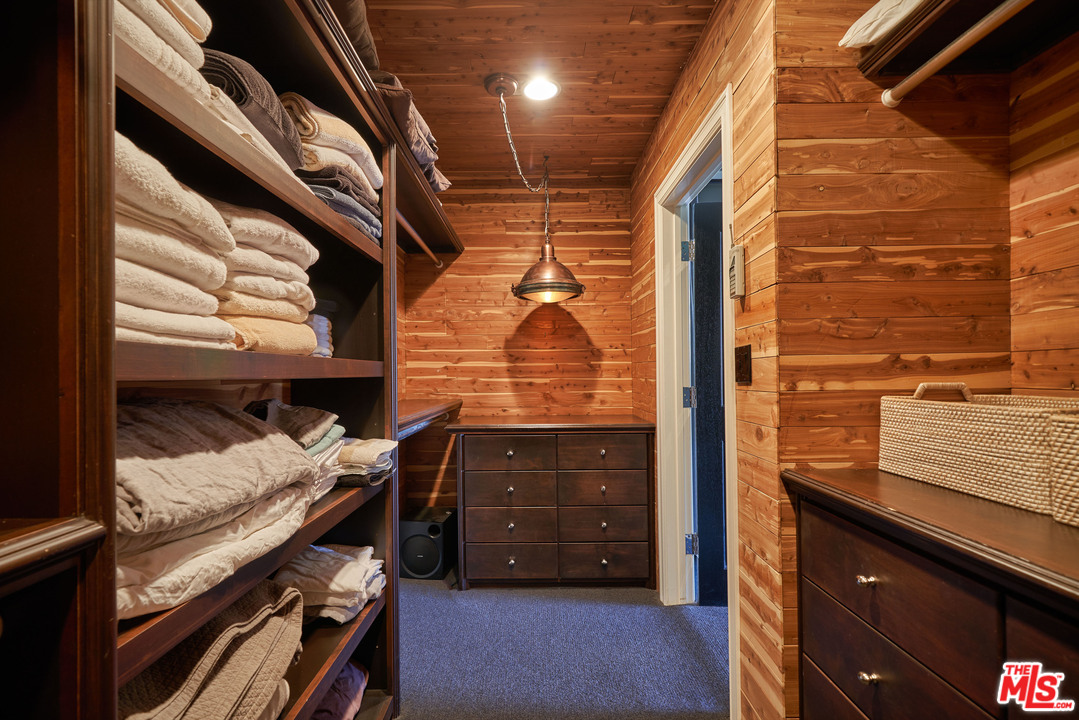 1488 North Kings Road Los Angeles, CA 90069 - Photo 29 of 53 a bathroom with a sink and a mirror