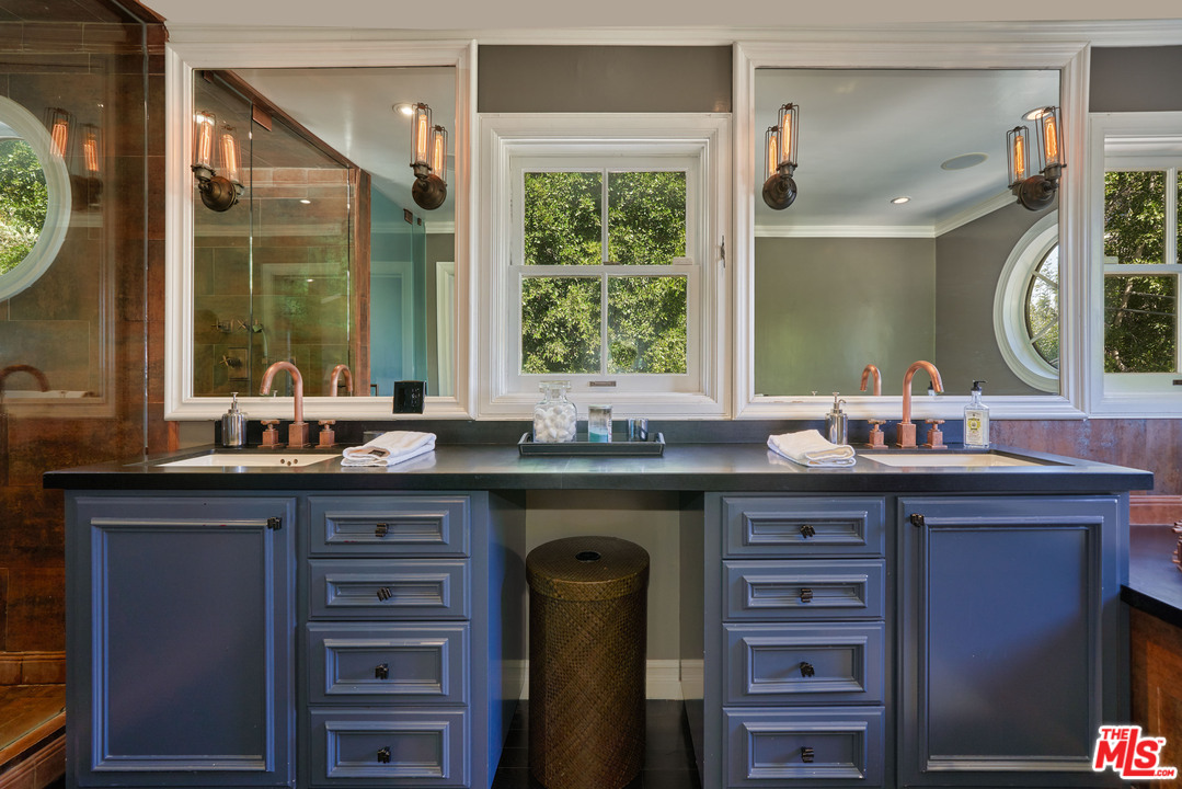 1488 North Kings Road Los Angeles, CA 90069 - Photo 30 of 53 a kitchen with a sink and a large window