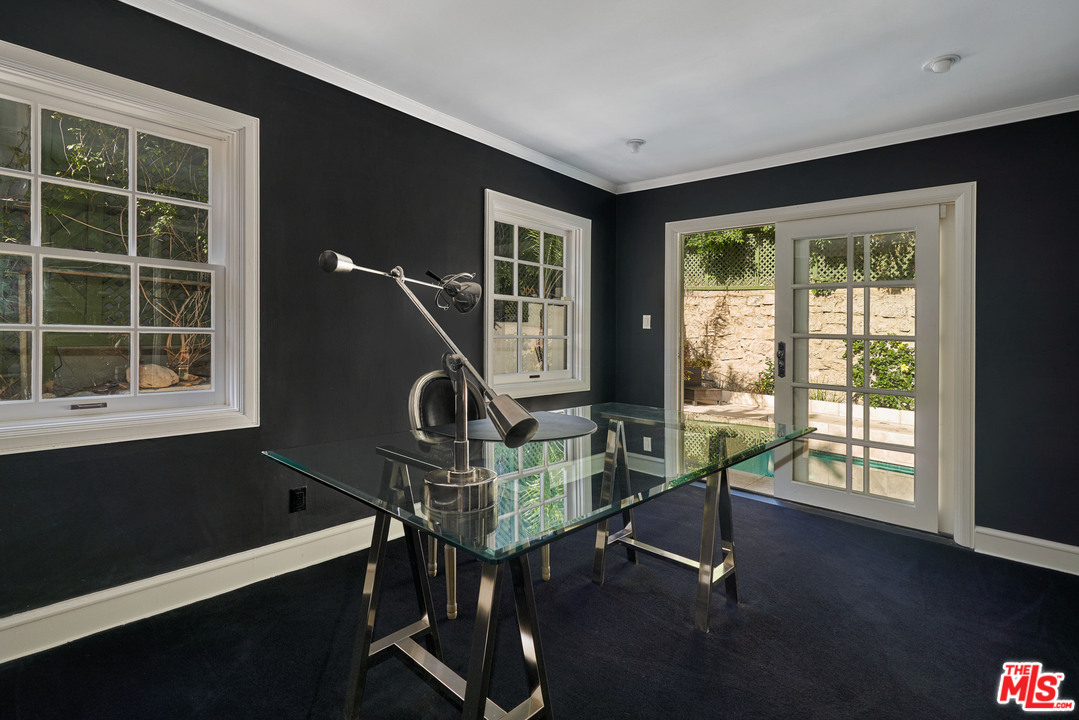 1488 North Kings Road Los Angeles, CA 90069 - Photo 38 of 53 a bedroom with furniture and a window