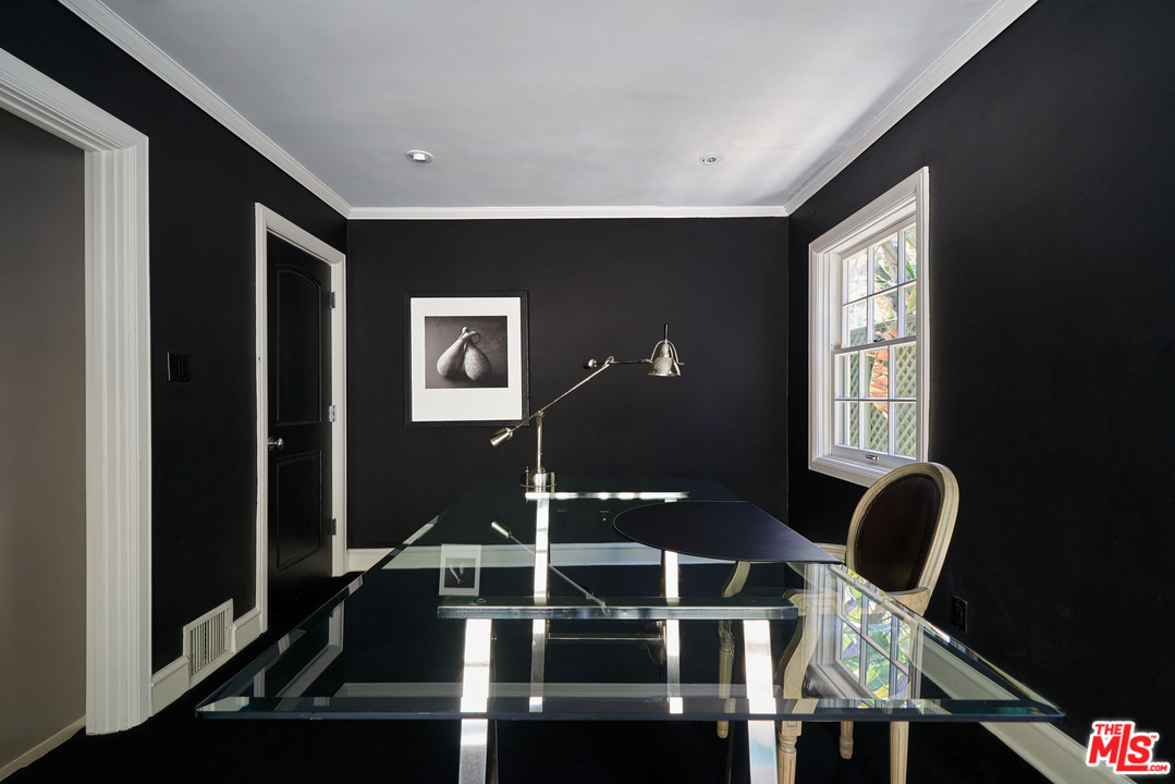 1488 North Kings Road Los Angeles, CA 90069 - Photo 39 of 53 a front view of a house with chairs