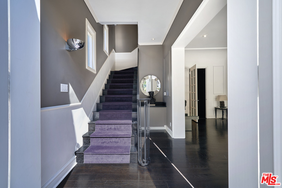 1488 North Kings Road Los Angeles, CA 90069 - Photo 5 of 53 a view of entryway and hall with wooden floor