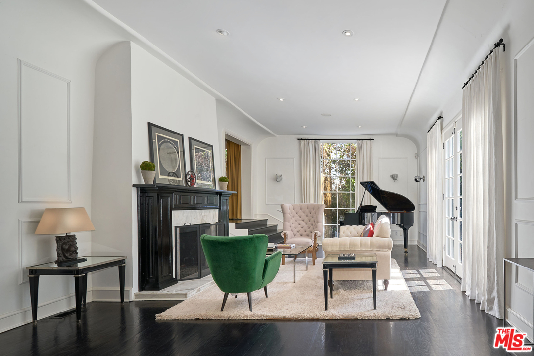 1488 North Kings Road Los Angeles, CA 90069 - Photo 44 of 53 a living room with furniture a dining table and a potted plant