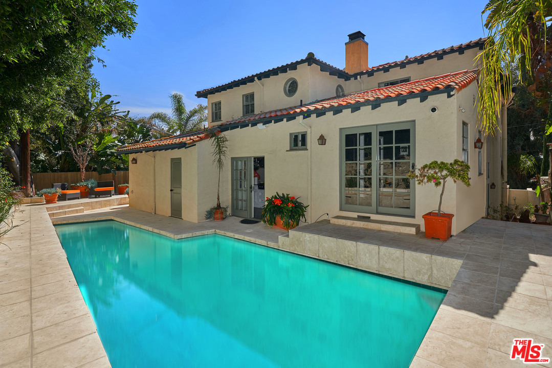 1488 North Kings Road Los Angeles, CA 90069 - Photo 46 of 53 a front view of a house with swimming pool