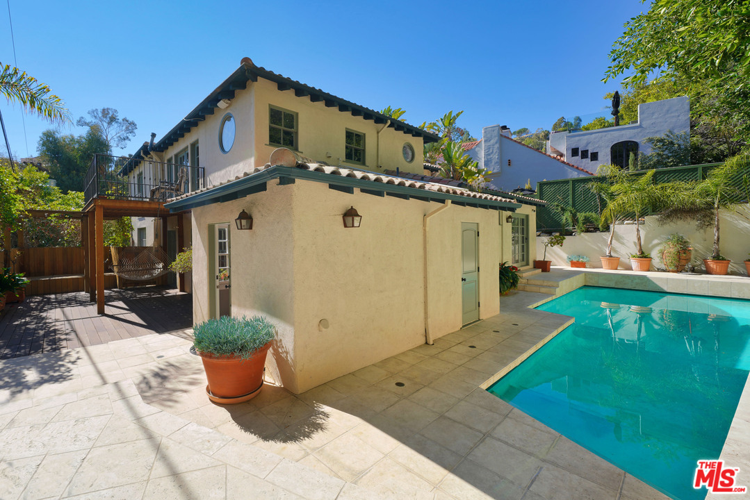 1488 North Kings Road Los Angeles, CA 90069 - Photo 47 of 53 a view of a house with backyard sitting area and garden