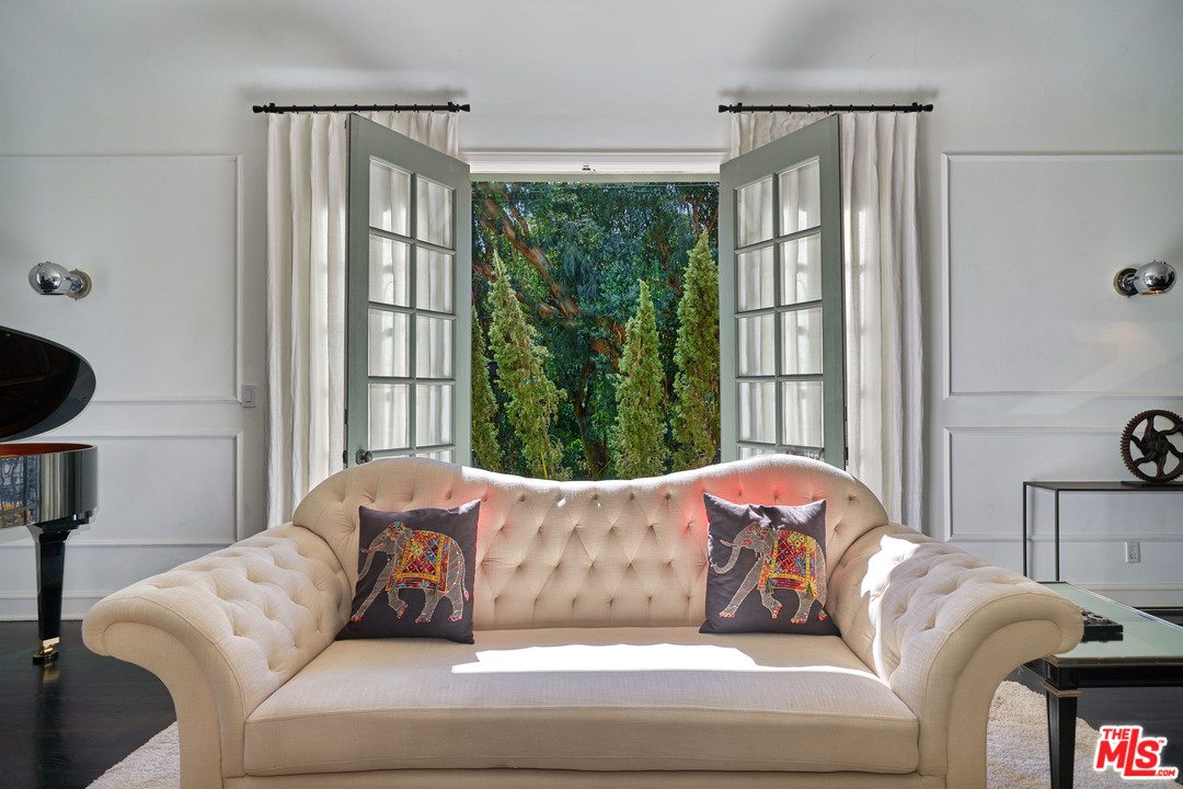 1488 North Kings Road Los Angeles, CA 90069 - Photo 10 of 53 a living room with couch and a window