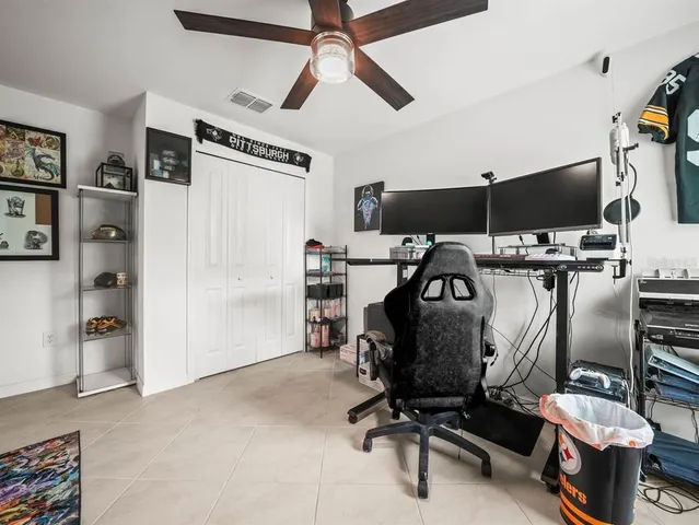 a view of a workspace with furniture