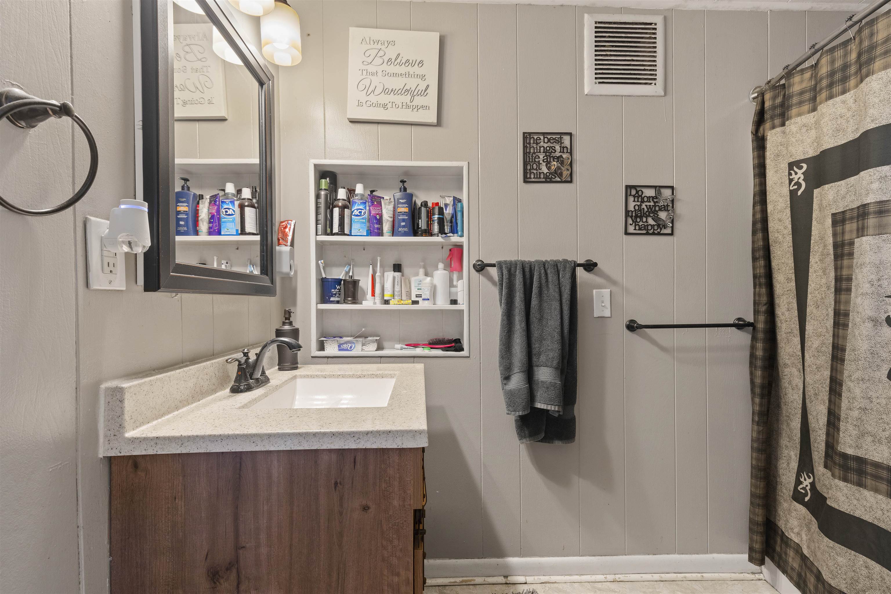 10784 East Utility Road Stillman Valley, IL 61084 - Photo 11 of 23 a bathroom with a sink mirror and shower
