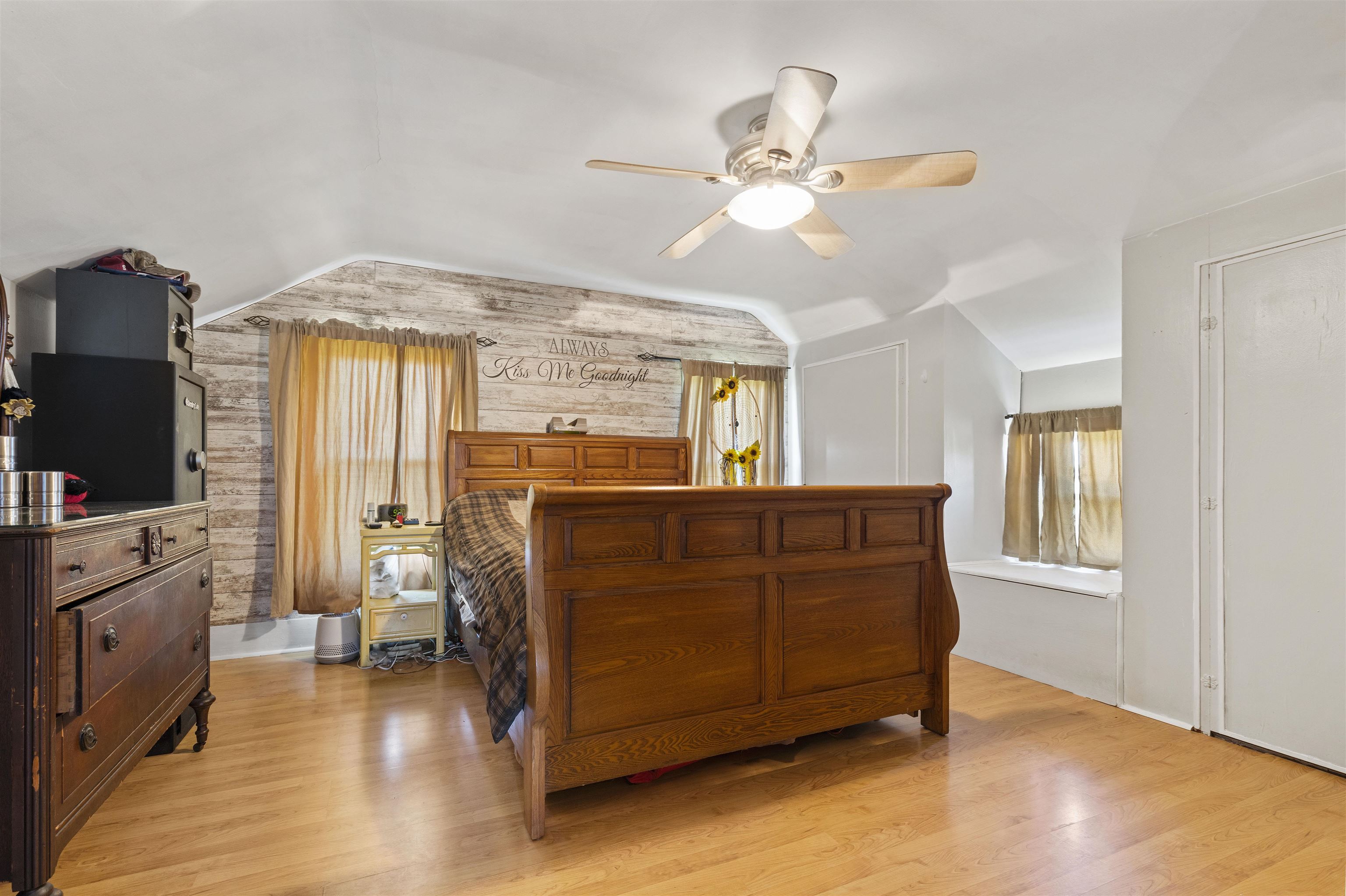 10784 East Utility Road Stillman Valley, IL 61084 - Photo 15 of 23 a bedroom with a bed and wooden floor