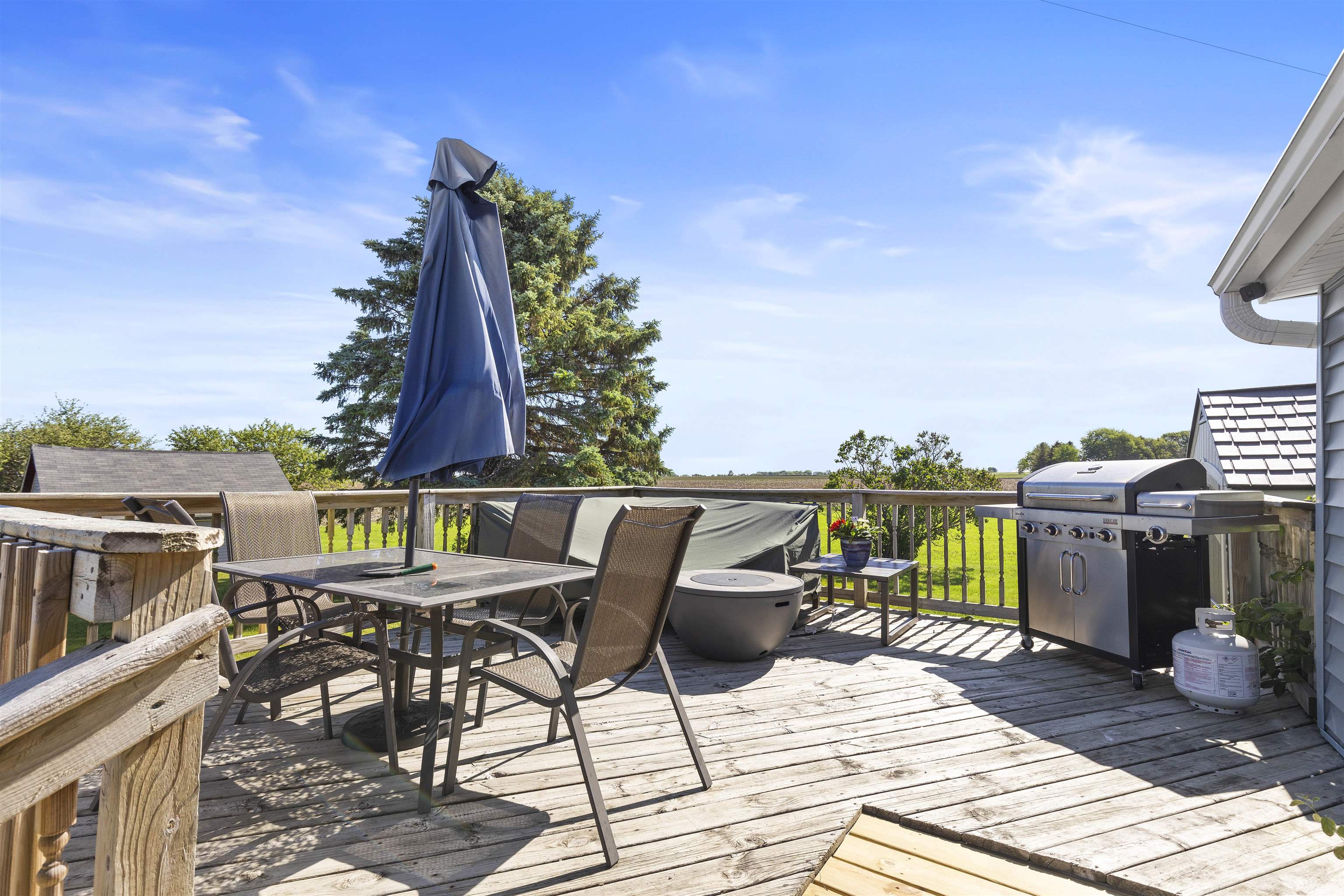 10784 East Utility Road Stillman Valley, IL 61084 - Photo 18 of 23 a view of a chairs and table on the terrace