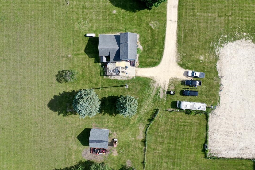 10784 East Utility Road Stillman Valley, IL 61084 - Photo 20 of 23 an aerial view of a house with a yard
