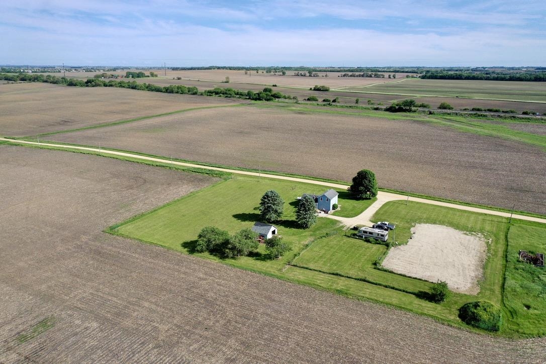 10784 East Utility Road Stillman Valley, IL 61084 - Photo 21 of 23 a view of a lake with a yard