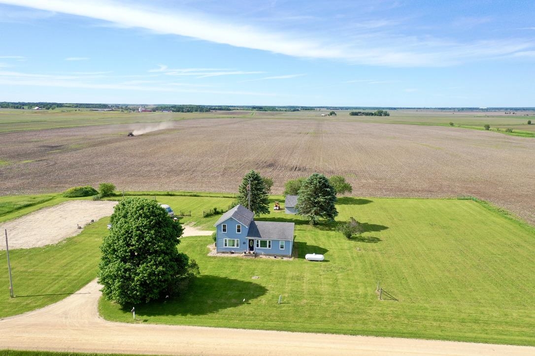 10784 East Utility Road Stillman Valley, IL 61084 - Photo 23 of 23 a view of a lake with a yard