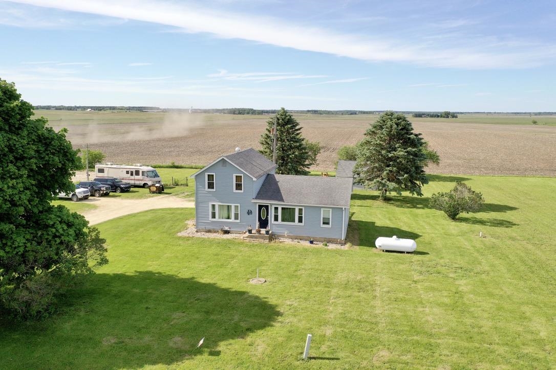 10784 East Utility Road Stillman Valley, IL 61084 - Photo 3 of 23 a view of a house with a big yard