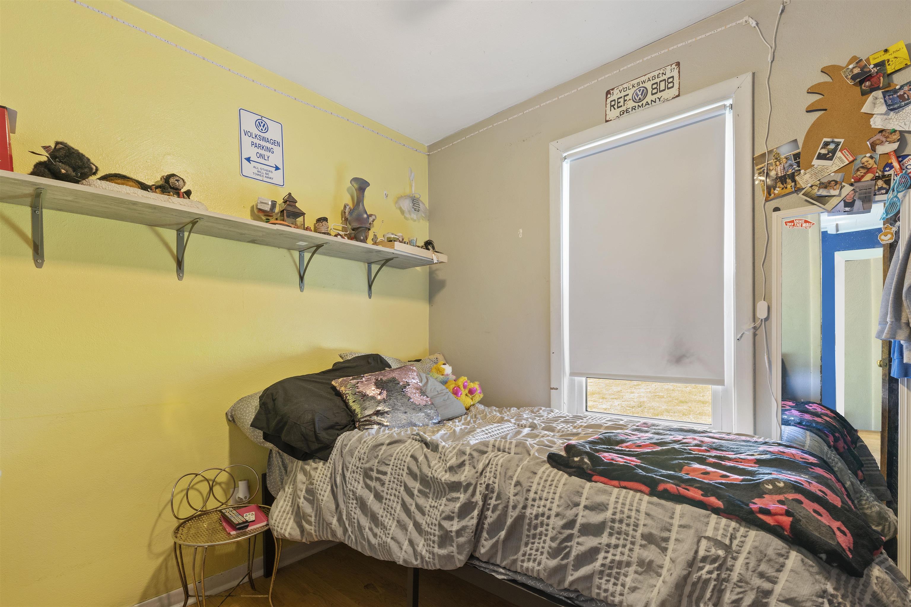 10784 East Utility Road Stillman Valley, IL 61084 - Photo 9 of 23 a bedroom with a bed and a window