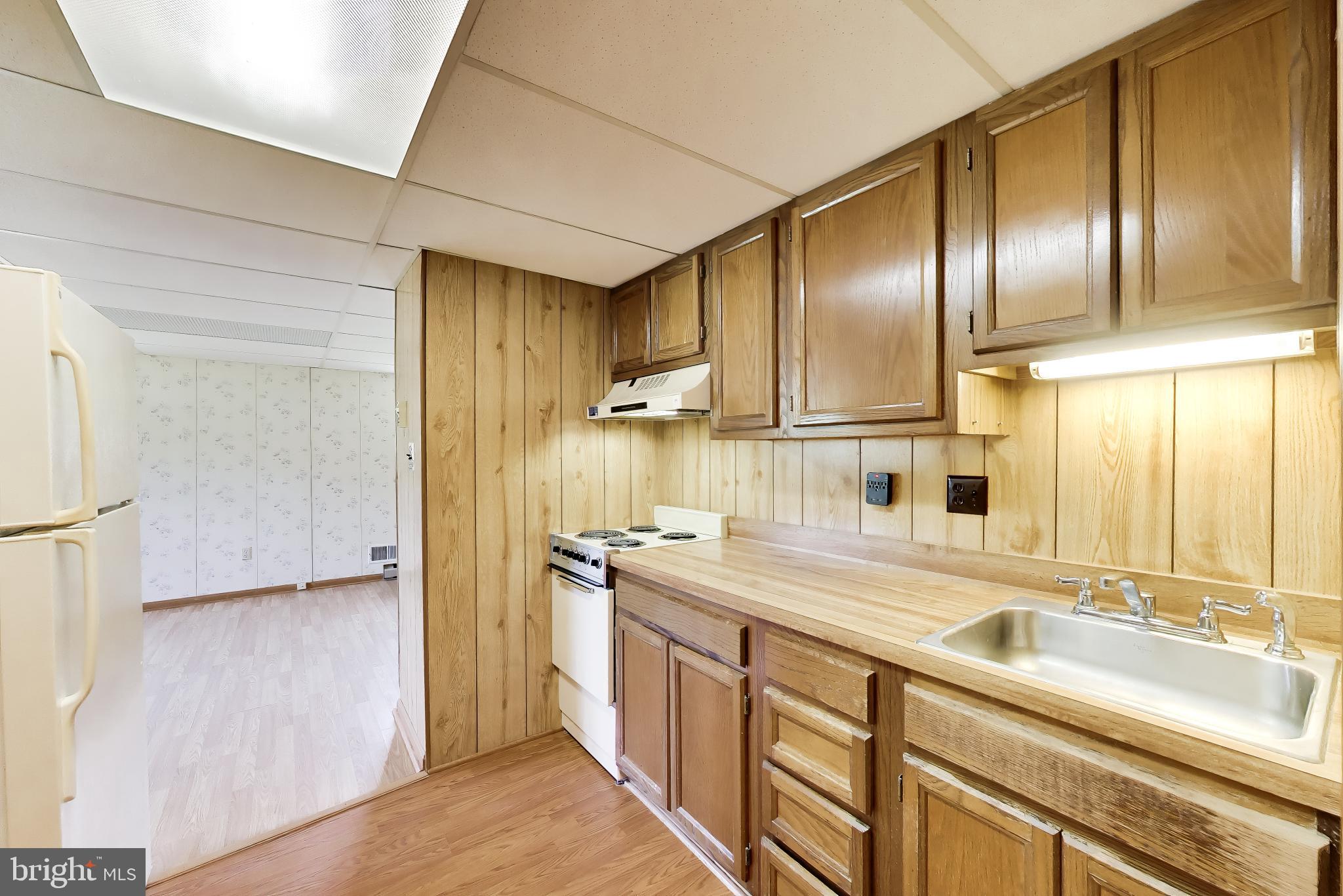 30075 Huntt Road Mechanicsville, MD 20659 - Photo 33 of 45 Kitchen with stove & refrigerator