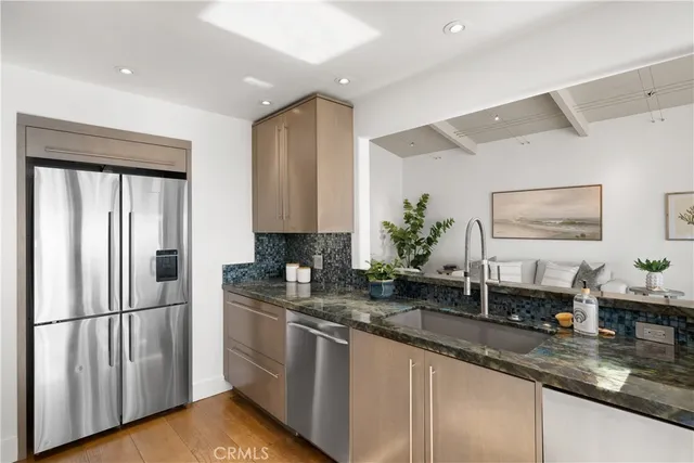 a view of a living room and dining room