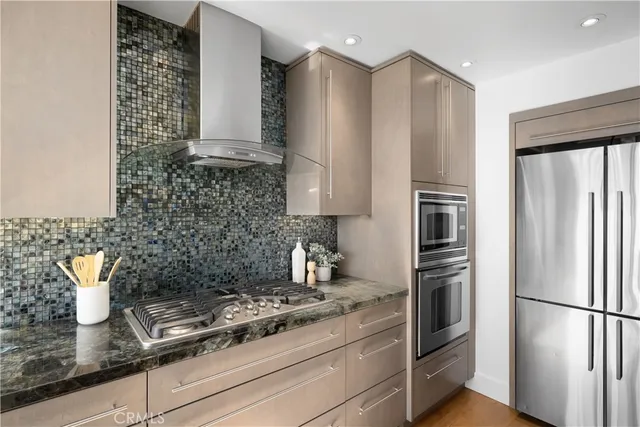 a spacious bedroom with a bed and a large window