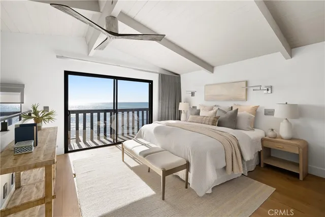 a bedroom with furniture and a table