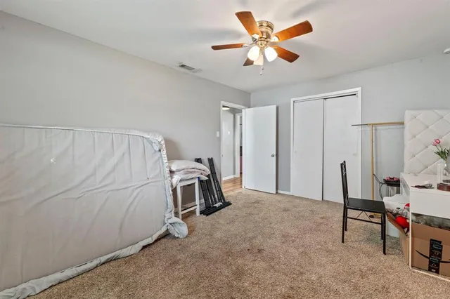 a sign board with a small yard