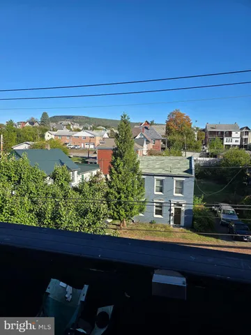 a view of a balcony with city view