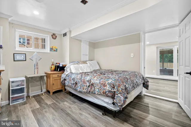 a bedroom with a bed and a cabinets