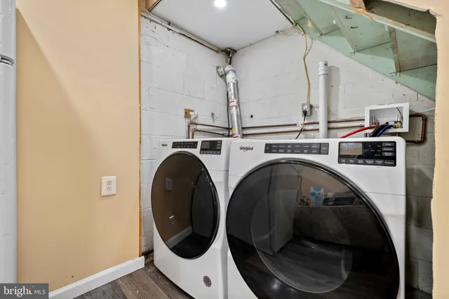 a utility room with dryer and washer