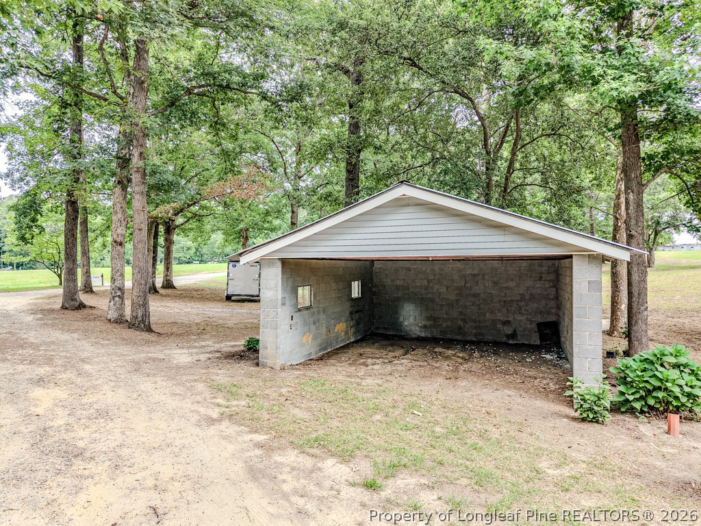 2957 Cypress Church Road Cameron, NC 28326 - Photo 36 of 48 Dirt Floor garage (no door)